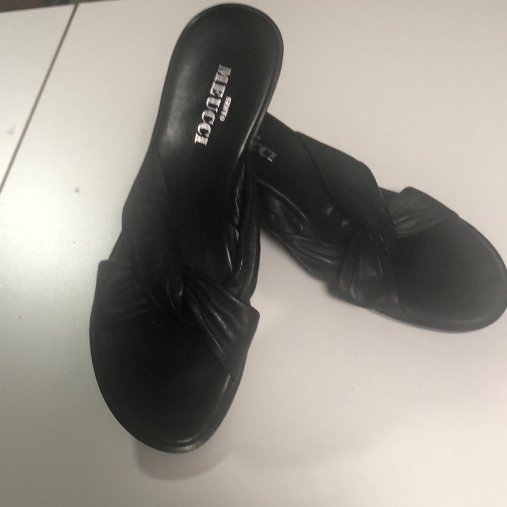 Slip on heels in great condition.